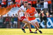 3 June 2023; Ross McQuillan of Armagh in action against Brian Kennedy of Tyrone during the GAA Football All-Ireland Senior Championship Round 2 match between Tyrone and Armagh at O'Neill's Healy Park in Omagh, Tyrone. Photo by Brendan Moran/Sportsfile