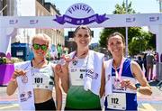 4 June 2023; Race winner Nakita Burke of Letterkenny AC, Donegal, with second place Courtney Maguire of Clonmel AC , Tipperary, left, and third place Teresa Doherty of Finn Valley, Donegal, after the 2023 Vhi Women’s Mini Marathon. More than 20,000 women from all over the country took to the streets of Dublin to run, walk and jog the 10km route, raising much needed funds for hundreds of charities. For further information please log on to www.vhiwomensminimarathon.ie. Photo by Sam Barnes/Sportsfile