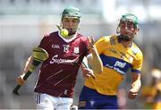 4 June 2023; Aaron Niland of Galway in action against James Hegarty of Clare during the Electric Ireland GAA Hurling All-Ireland Minor Championship Final match between Clare and Galway at FBD Semple Stadium in Thurles, Tipperary. Photo by Michael P Ryan/Sportsfile