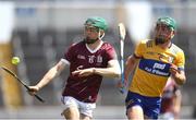 4 June 2023; Aaron Niland of Galway in action against James Hegarty of Clare during the Electric Ireland GAA Hurling All-Ireland Minor Championship Final match between Clare and Galway at FBD Semple Stadium in Thurles, Tipperary. Photo by Michael P Ryan/Sportsfile