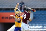 4 June 2023; Jason Rabbitte of Galway in action against Ronan Keane of Clare during the Electric Ireland GAA Hurling All-Ireland Minor Championship Final match between Clare and Galway at FBD Semple Stadium in Thurles, Tipperary. Photo by Michael P Ryan/Sportsfile