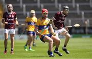 4 June 2023; Jack Mescal of Clare in action against Jason Rabbitte of Galway during the Electric Ireland GAA Hurling All-Ireland Minor Championship Final match between Clare and Galway at FBD Semple Stadium in Thurles, Tipperary. Photo by Michael P Ryan/Sportsfile