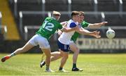 4 June 2023; Tom Moran of Wicklow in action against Adrian Enright and Barry Coleman of Limerick during the Tailteann Cup Group 3 Round 3 match between Limerick and Wicklow at Laois Hire O'Moore Park in Portlaoise, Laois. Photo by Matt Browne/Sportsfile