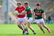 4 June 2023; Bevan Duffy of Louth in action against Ryan O'Donoghue of Mayo during the GAA Football All-Ireland Senior Championship Round 2 match between Mayo and Louth at Hastings Insurance MacHale Park in Castlebar, Mayo. Photo by Seb Daly/Sportsfile