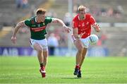 4 June 2023; Conor Grimes of Louth in action against David McBrien of Mayo during the GAA Football All-Ireland Senior Championship Round 2 match between Mayo and Louth at Hastings Insurance MacHale Park in Castlebar, Mayo. Photo by Seb Daly/Sportsfile