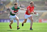 4 June 2023; Conor Grimes of Louth in action against David McBrien of Mayo during the GAA Football All-Ireland Senior Championship Round 2 match between Mayo and Louth at Hastings Insurance MacHale Park in Castlebar, Mayo. Photo by Seb Daly/Sportsfile