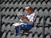 4 June 2023; Monaghan supporter Anne Brennan, from Castleblayney, Monaghan, reads her newspaper ahead of the GAA Football All-Ireland Senior Championship Round 2 match between Monaghan and Clare at St Tiernach's Park in Clones, Monaghan. Photo by Daire Brennan/Sportsfile