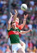 4 June 2023; Matthew Ruane of Mayo in action against Donal McKenny of Louth during the GAA Football All-Ireland Senior Championship Round 2 match between Mayo and Louth at Hastings Insurance MacHale Park in Castlebar, Mayo. Photo by Seb Daly/Sportsfile