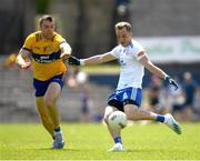 4 June 2023; Jack Mc Carron of Monaghan in action against Cillian Brennan of Clare during the GAA Football All-Ireland Senior Championship Round 2 match between Monaghan and Clare at St Tiernach's Park in Clones, Monaghan. Photo by Daire Brennan/Sportsfile
