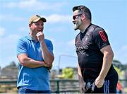 4 June 2023; TV analyst Michael Murphy, left, and Sligo selector Paul Durcan, both All-Ireland SFC winners with Donegal, in conversation before the GAA Football All-Ireland Senior Championship Round 2 match between Roscommon and Sligo at Dr Hyde Park in Roscommon. Photo by Piaras Ó Mídheach/Sportsfile