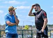 4 June 2023; TV analyst Michael Murphy, left, and Sligo selector Paul Durcan, both All-Ireland SFC winners with Donegal, in conversation before the GAA Football All-Ireland Senior Championship Round 2 match between Roscommon and Sligo at Dr Hyde Park in Roscommon. Photo by Piaras Ó Mídheach/Sportsfile