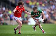 4 June 2023; Pádraig O’Hora of Mayo in action against Ciaran Murphy of Louth during the GAA Football All-Ireland Senior Championship Round 2 match between Mayo and Louth at Hastings Insurance MacHale Park in Castlebar, Mayo. Photo by Seb Daly/Sportsfile