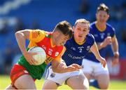 4 June 2023; Conor Crowley of Carlow in action against Patrick Fox of Longford during the Tailteann Cup Group 3 Round 3 match between Longford and Carlow at Laois Hire O'Moore Park in Portlaoise, Laois. Photo by Matt Browne/Sportsfile