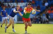 4 June 2023; Colm Hulton of Carlow in action against Patrick Fox of Longford during the Tailteann Cup Group 3 Round 3 match between Longford and Carlow at Laois Hire O'Moore Park in Portlaoise, Laois. Photo by Matt Browne/Sportsfile