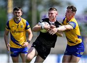 4 June 2023; Alan Reilly of Sligo in action against Cian McKeon of Roscommon during the GAA Football All-Ireland Senior Championship Round 2 match between Roscommon and Sligo at Dr Hyde Park in Roscommon. Photo by Piaras Ó Mídheach/Sportsfile