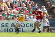 4 June 2023; Adam Screeney of Offaly in action against Darragh O'Sullivan of Cork during the O’Neills.com GAA Hurling All-Ireland U20 Championship Final match between Cork and Offaly at FBD Semple Stadium in Thurles, Tipperary. Photo by Michael P Ryan/Sportsfile