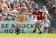 4 June 2023; Adam Screeney of Offaly in action against Darragh O'Sullivan of Cork during the O’Neills.com GAA Hurling All-Ireland U20 Championship Final match between Cork and Offaly at FBD Semple Stadium in Thurles, Tipperary. Photo by Michael P Ryan/Sportsfile