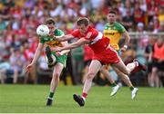 4 June 2023; Ciaran Thompson of Donegal has a shot blocked by Brendan Rogers of Derry during the GAA Football All-Ireland Senior Championship Round 2 match between Donegal and Derry at MacCumhaill Park in Ballybofey, Donegal. Photo by Brendan Moran/Sportsfile