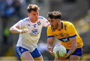 4 June 2023; Aaron Griffin of Clare in action against Karl O'Connell of Monaghan during the GAA Football All-Ireland Senior Championship Round 2 match between Monaghan and Clare at St Tiernach's Park in Clones, Monaghan. Photo by Daire Brennan/Sportsfile