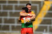 4 June 2023; Carlow players Jamie Clarke, 15, and Darragh Foley celebrate after the Tailteann Cup Group 3 Round 3 match between Longford and Carlow at Laois Hire O'Moore Park in Portlaoise, Laois. Photo by Matt Browne/Sportsfile