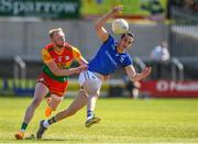 4 June 2023; Darren Gallagher of Longford in action against Jordan Morrissey of Carlow during the Tailteann Cup Group 3 Round 3 match between Longford and Carlow at Laois Hire O'Moore Park in Portlaoise, Laois. Photo by Matt Browne/Sportsfile