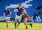 4 June 2023; Michael Quinn of Longford in action against Mikey Bambrick of Carlow during the Tailteann Cup Group 3 Round 3 match between Longford and Carlow at Laois Hire O'Moore Park in Portlaoise, Laois. Photo by Matt Browne/Sportsfile