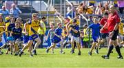 4 June 2023; Children run onto the pitch after the GAA Football All-Ireland Senior Championship Round 2 match between Roscommon and Sligo at Dr Hyde Park in Roscommon. Photo by Piaras Ó Mídheach/Sportsfile