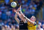 4 June 2023; Luke Towey of Sligo in action against Eoin McCormack of Roscommon during the GAA Football All-Ireland Senior Championship Round 2 match between Roscommon and Sligo at Dr Hyde Park in Roscommon. Photo by Piaras Ó Mídheach/Sportsfile