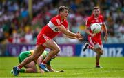 4 June 2023; Shane McGuigan of Derry in action against Mark Curran of Donegal during the GAA Football All-Ireland Senior Championship Round 2 match between Donegal and Derry at MacCumhaill Park in Ballybofey, Donegal. Photo by Brendan Moran/Sportsfile