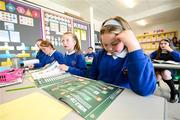 7 June 2023; Lucy Morgan, right, and Grace McMahon during the launch of the Republic of Ireland women's FIFA Women's World Cup school activity book with Republic of Ireland manager Vera Pauw at St Patrick's National School in Corduff, Dublin. Photo by Stephen McCarthy/Sportsfile