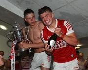 4 June 2023; Cork players Ben Cunningham, left, and Michael Mullins celebrate in the dressing room after the O’Neills.com GAA Hurling All-Ireland U20 Championship Final match between Cork and Offaly at FBD Semple Stadium in Thurles, Tipperary. Photo by Michael P Ryan/Sportsfile