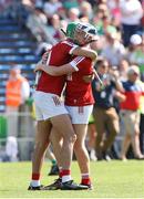 4 June 2023; Cork players Ben Cunningham, left, and Adam O'Sullivan celebrate after the O’Neills.com GAA Hurling All-Ireland U20 Championship Final match between Cork and Offaly at FBD Semple Stadium in Thurles, Tipperary. Photo by Michael P Ryan/Sportsfile