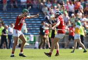 4 June 2023; Cork players Ben Cunningham, left, and Adam O'Sullivan celebrate after the O’Neills.com GAA Hurling All-Ireland U20 Championship Final match between Cork and Offaly at FBD Semple Stadium in Thurles, Tipperary. Photo by Michael P Ryan/Sportsfile