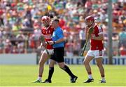 4 June 2023; Ben O'Connor of Cork is shown a yellow card by referee Chris Mooney during the O’Neills.com GAA Hurling All-Ireland U20 Championship Final match between Cork and Offaly at FBD Semple Stadium in Thurles, Tipperary. Photo by Michael P Ryan/Sportsfile