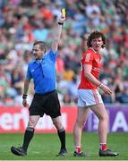 4 June 2023; Referee Noel Mooney shows a yellow card to Ciaran Murphy of Louth during the GAA Football All-Ireland Senior Championship Round 2 match between Mayo and Louth at Hastings Insurance MacHale Park in Castlebar, Mayo. Photo by Seb Daly/Sportsfile