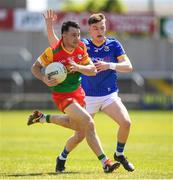 4 June 2023; Jamie Clarke of Carlow in action against Bryan Masterson of Longford during the Tailteann Cup Group 3 Round 3 match between Longford and Carlow at Laois Hire O'Moore Park in Portlaoise, Laois. Photo by Matt Browne/Sportsfile