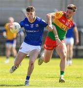 4 June 2023; Keelin McGann of Longford in action against Josh Moore of Carlow during the Tailteann Cup Group 3 Round 3 match between Longford and Carlow at Laois Hire O'Moore Park in Portlaoise, Laois. Photo by Matt Browne/Sportsfile