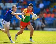 4 June 2023; Colm Hulton of Carlow in action against Patrick Fox of Longford during the Tailteann Cup Group 3 Round 3 match between Longford and Carlow at Laois Hire O'Moore Park in Portlaoise, Laois. Photo by Matt Browne/Sportsfile