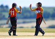 5 June 2023; Polly Inglis of Scorchers, left, and Gaby Lewis celebrate after their side's victory during the Evoke Super Series 2023 match between Scorchers and Typhoons at Oak Hill Cricket Club in Kilbride, Wicklow. Photo by Tyler Miller/Sportsfile