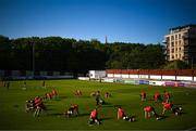 5 June 2023; Derry City players warm up before the SSE Airtricity Men's Premier Division match between St Patrick's Athletic and Derry City at Richmond Park in Dublin. Photo by Harry Murphy/Sportsfile