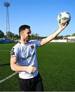 5 June 2023; Patrick Hoban of Dundalk celebrates with the match ball after scoring a hat-trick and becoming the club record goal scorer after the SSE Airtricity Men's Premier Division match between Dundalk and UCD at Oriel Park in Dundalk, Louth. Photo by Stephen Marken/Sportsfile
