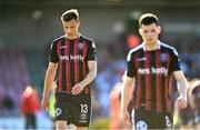 5 June 2023; Bohemians players, Kacper Radkowski, left, and Ali Coote leave the field after their side's defeat in the SSE Airtricity Men's Premier Division match between Cork City and Bohemians at Turner's Cross in Cork. Photo by Eóin Noonan/Sportsfile