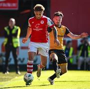 5 June 2023; Sam Curtis of St Patrick's Athletic in action against Cameron Dummigan of Derry City during the SSE Airtricity Men's Premier Division match between St Patrick's Athletic and Derry City at Richmond Park in Dublin. Photo by Harry Murphy/Sportsfile