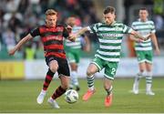 2 June 2023; Jack Byrne of Shamrock Rovers in action against Paul Doyle of Dundalk during the SSE Airtricity Men's Premier Division match between Shamrock Rovers and Dundalk at Tallaght Stadium in Dublin. Photo by Stephen McCarthy/Sportsfile