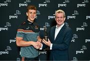 7 June 2023; PwC GAA/GPA Player of the Month for May winner Derry footballer Shane McGuigan, left, receives his award from  PwC Managing Partner Feargal O’Rourke during the PwC GAA/GPA Player of the Month and PwC GPA Women’s Player of the Month Awards at PwC offices in Dublin. Photo by Sam Barnes/Sportsfile