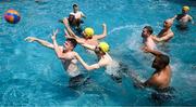 8 June 2023; Evan Ferguson is tackled by Mikey Johnston and Caoimhin Kelleher in waterpolo during a Republic of Ireland pool recovery session at the Calista Luxury Resort in Antalya, Turkey. Photo by Stephen McCarthy/Sportsfile