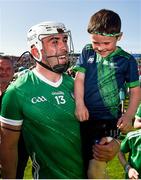 28 May 2023; Aaron Gillane of Limerick celebrates with Limerick supporter John O'Donnell, aged 8, from Patrickswell, Co Limerick, after the Munster GAA Hurling Senior Championship Round 5 match between Limerick and Cork at TUS Gaelic Grounds in Limerick. Photo by Daire Brennan/Sportsfile