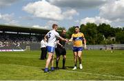 4 June 2023; Monaghan captain Kieran Duffy shakes hands with Clare captain Jamie Malone ahead of the GAA Football All-Ireland Senior Championship Round 2 match between Monaghan and Clare at St Tiernach's Park in Clones, Monaghan. Photo by Daire Brennan/Sportsfile