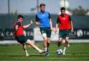 9 June 2023; Nathan Collins with Darragh Lenihan, left, and John Egan, right, during a Republic of Ireland training session at Calista Sports Centre in Antalya, Turkey. Photo by Stephen McCarthy/Sportsfile
