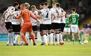 9 June 2023; Dundalk players break away from the huddle before the SSE Airtricity Men's Premier Division match between Cork City and Dundalk at Turner's Cross in Cork. Photo by Eóin Noonan/Sportsfile